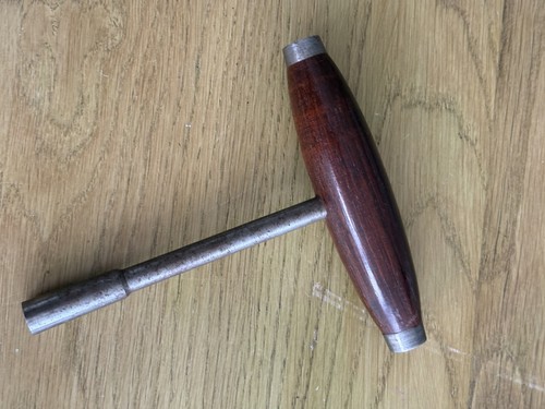 Vintage piano tuning tool rose